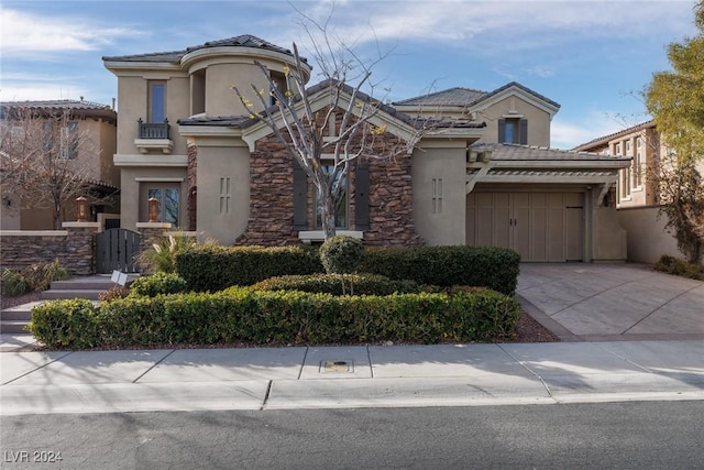 mediterranean / spanish-style home featuring a garage