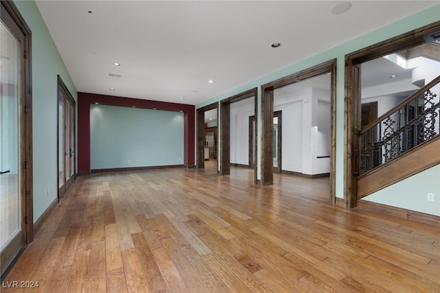 unfurnished living room featuring light hardwood / wood-style flooring