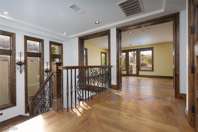 hallway with parquet flooring