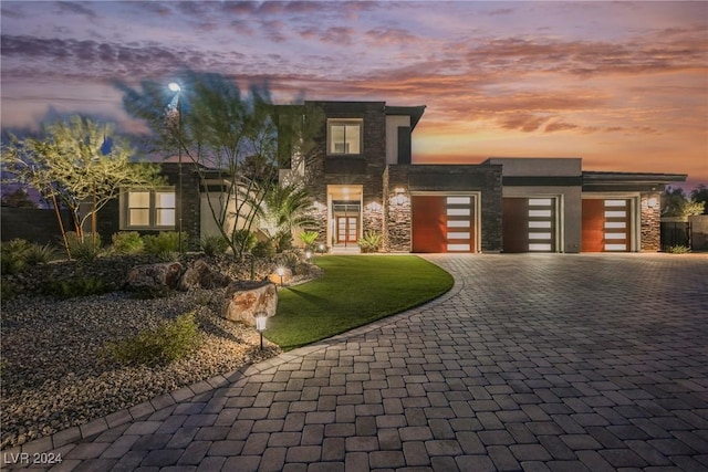 view of front of property featuring a garage