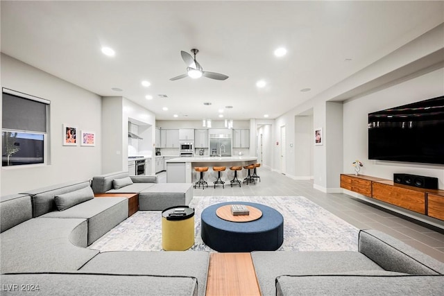 living room featuring ceiling fan