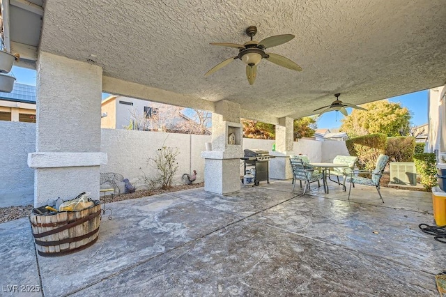 view of patio featuring ceiling fan and grilling area