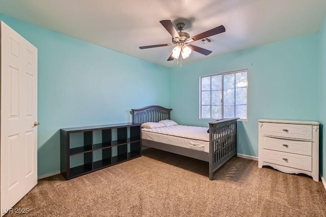 bedroom featuring carpet floors, ceiling fan, and baseboards