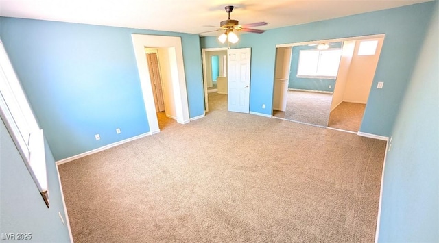 6019 Orca Lilly St, North Las Vegas, NV 89031 - unfurnished bedroom with ceiling fan, baseboards, carpet flooring, and a closet
