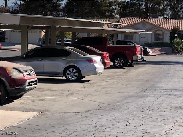 view of parking featuring a carport