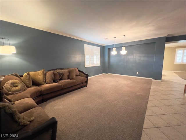 living room with light tile patterned floors and ornamental molding