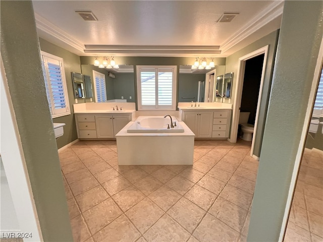 bathroom featuring tile patterned floors, vanity, a chandelier, and toilet