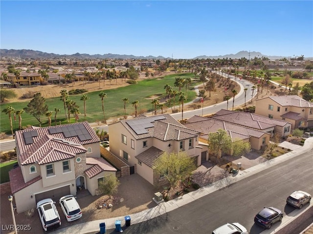 birds eye view of property featuring a mountain view