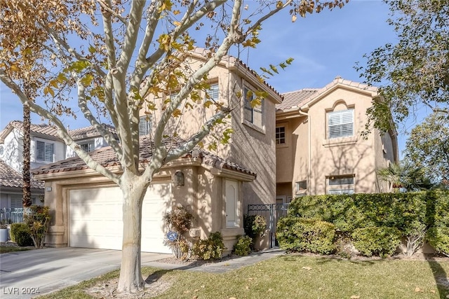 view of front of property with a garage