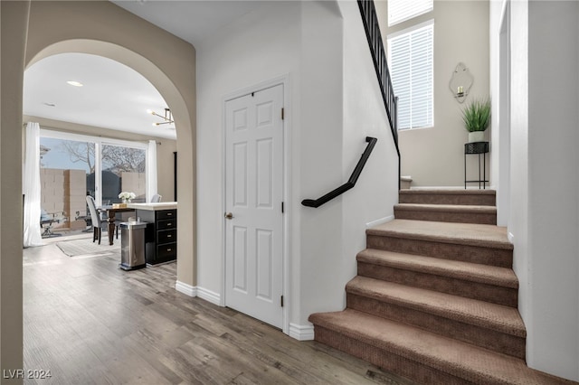 stairway with wood-type flooring