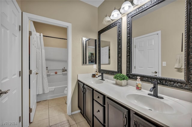 full bathroom featuring tile patterned floors, shower / bath combo, toilet, and vanity