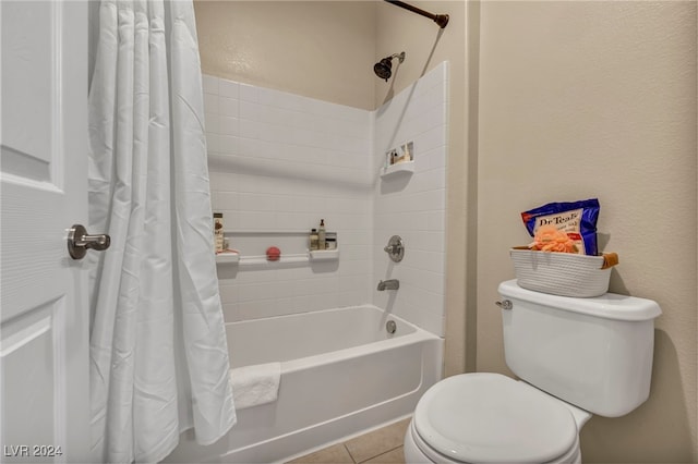 bathroom featuring tile patterned floors, shower / tub combo, and toilet