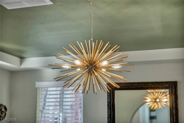 room details with an inviting chandelier