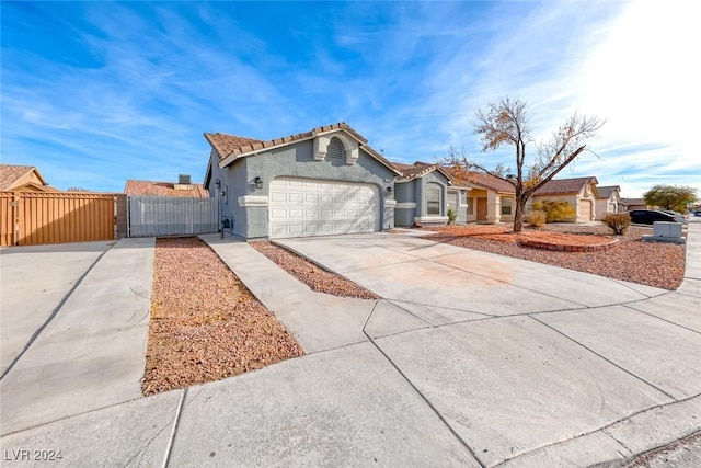 single story home with a garage