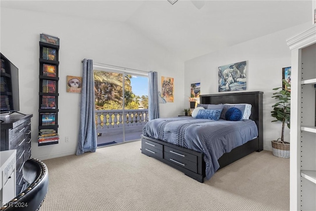 bedroom with light carpet, access to exterior, and vaulted ceiling