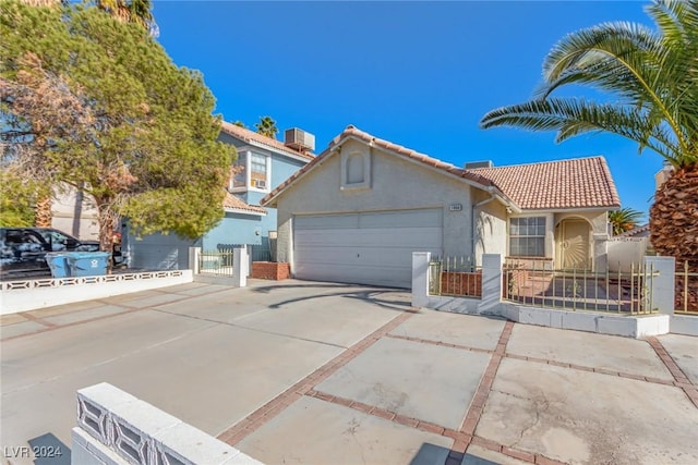 view of front of home with a garage