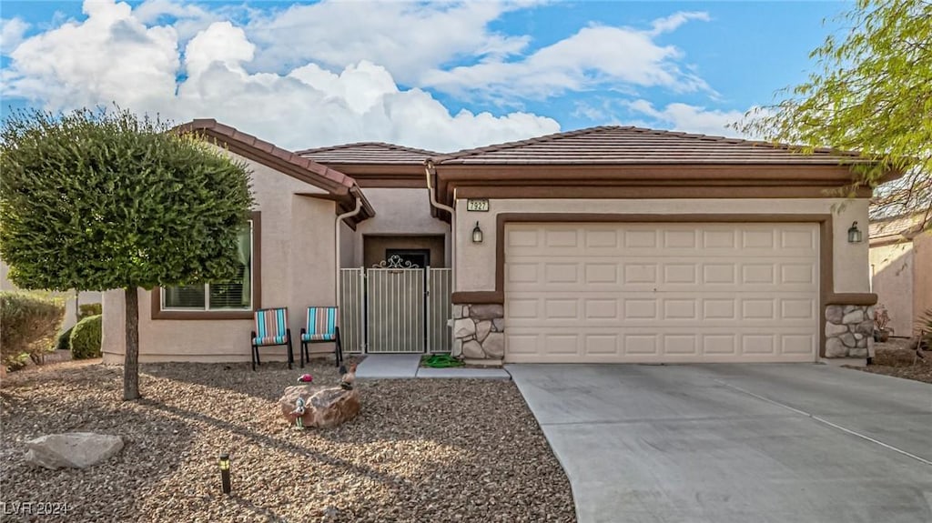 view of front of home with a garage