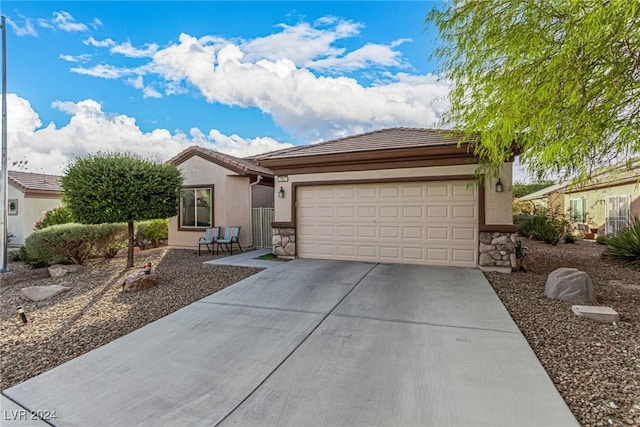 single story home with a garage