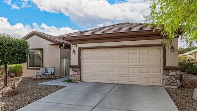 ranch-style house featuring a garage