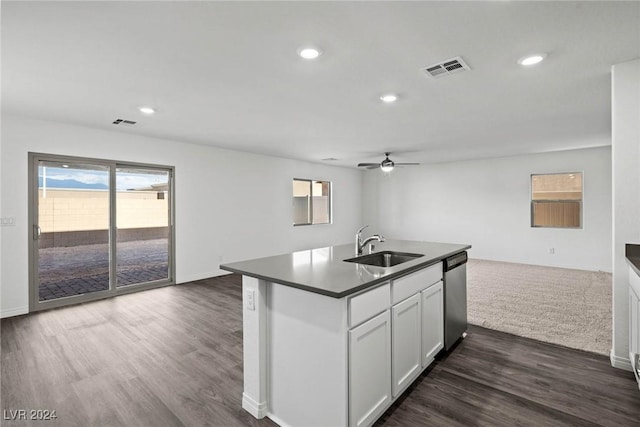 kitchen featuring ceiling fan, dark wood-type flooring, sink, dishwasher, and white cabinetry