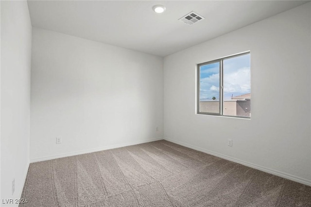 unfurnished room with carpet