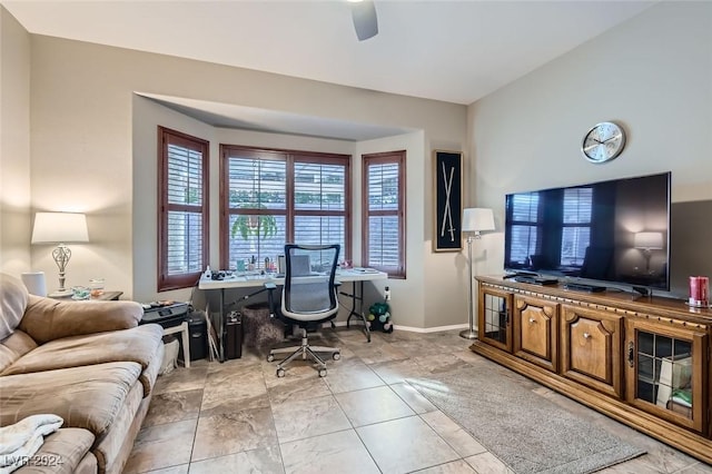 office with ceiling fan and light tile patterned floors