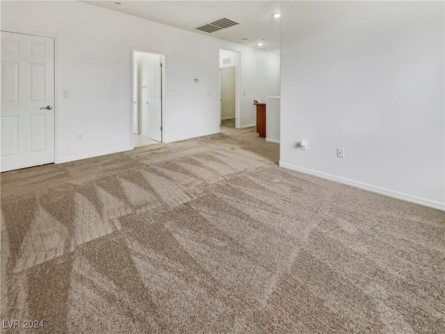 empty room with carpet flooring