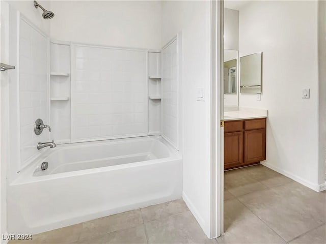 bathroom with tile patterned floors, vanity, and bathtub / shower combination