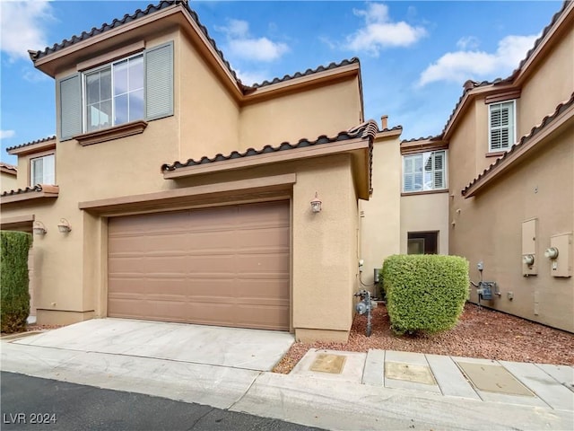 view of front of property featuring a garage