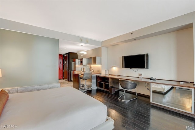 bedroom featuring hardwood / wood-style flooring