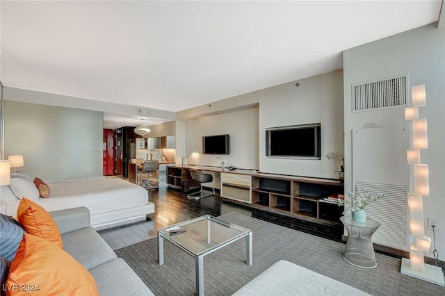 living room with hardwood / wood-style floors