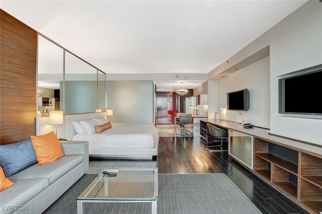 bedroom featuring dark hardwood / wood-style floors