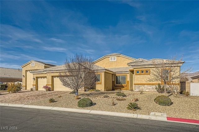 view of front of property with a garage