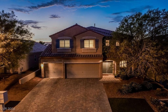 view of front of property featuring a garage