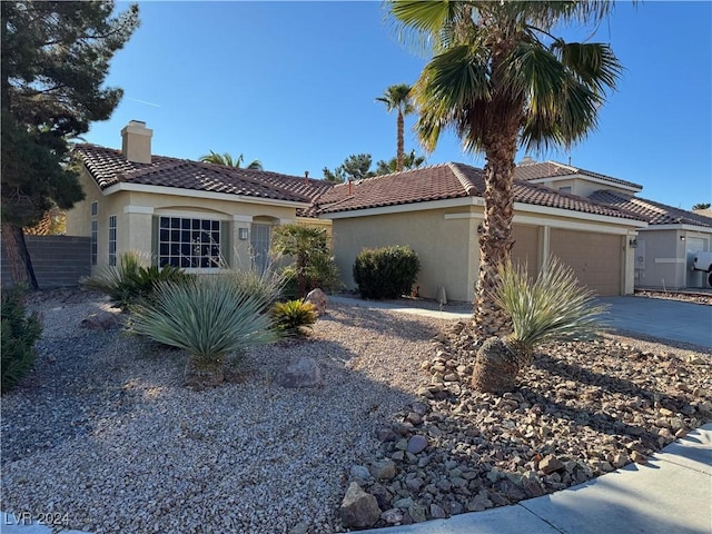 view of front of property with a garage