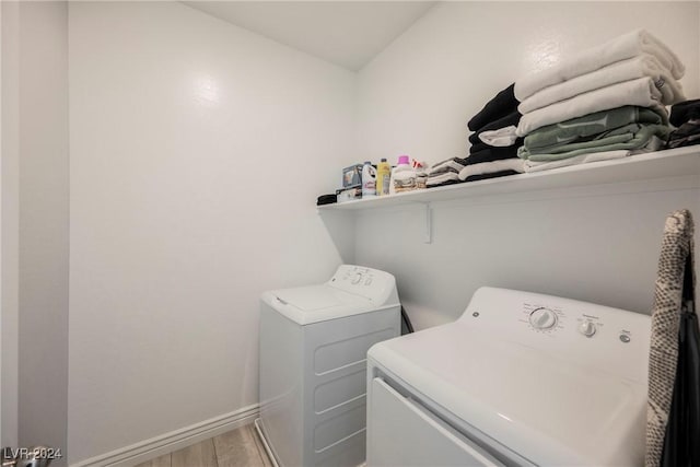 laundry room featuring washer and clothes dryer