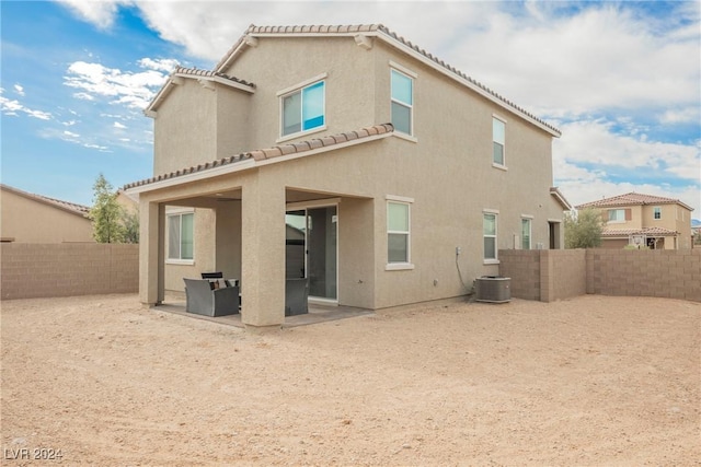 back of property featuring a patio and central AC unit