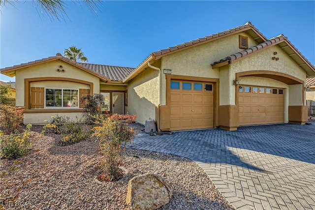 view of front of home with a garage