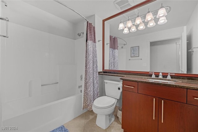 full bathroom with toilet, tile patterned flooring, vanity, and shower / tub combo with curtain