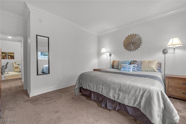 carpeted bedroom with ornamental molding