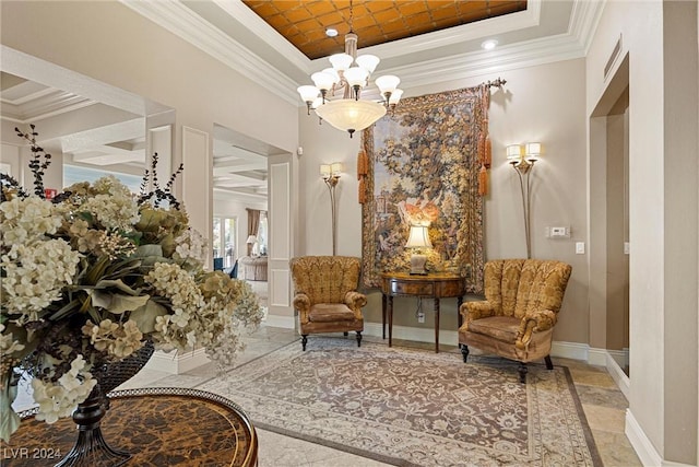 interior space featuring a raised ceiling, crown molding, and a chandelier