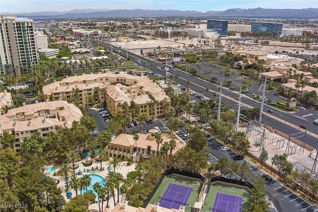 birds eye view of property featuring a mountain view