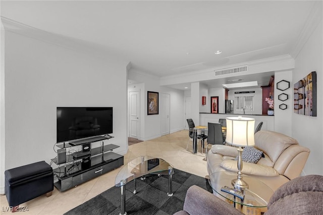 tiled living room featuring ornamental molding