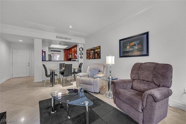 tiled living room with crown molding