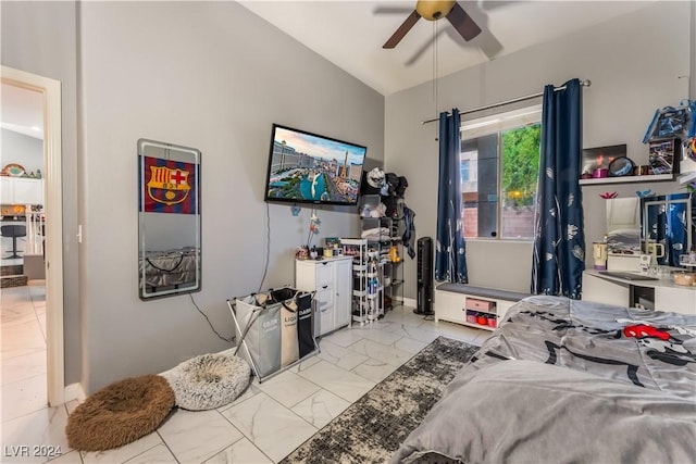 bedroom featuring ceiling fan and lofted ceiling