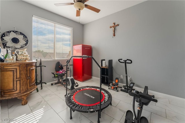 workout room featuring ceiling fan