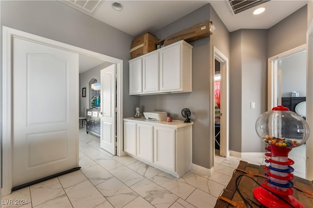 kitchen with white cabinets