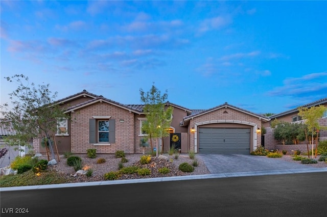 view of front of home with a garage