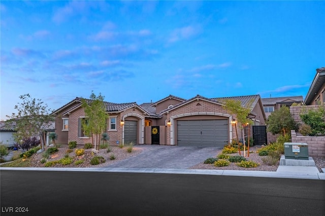 view of front of home with a garage