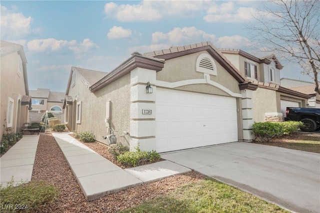 view of home's exterior with a garage